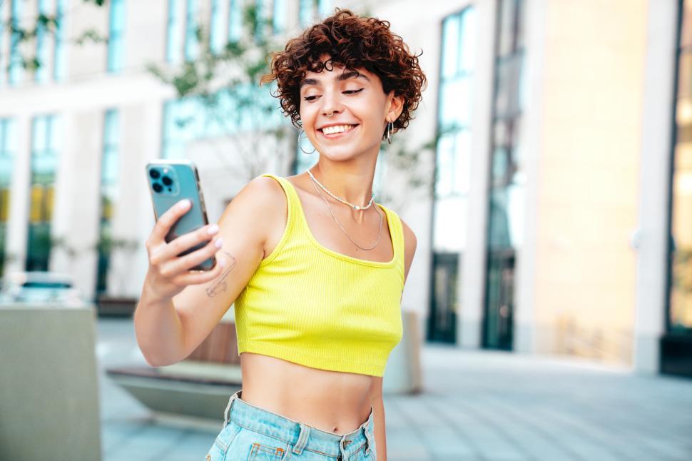Free Image of A woman taking a selfie 