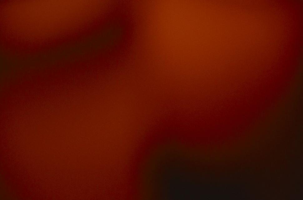 Free Image of Abstract orange and red blurry background 