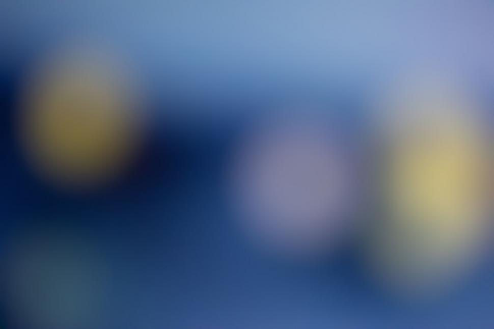 Free Image of Soft bokeh circles on a blue background 