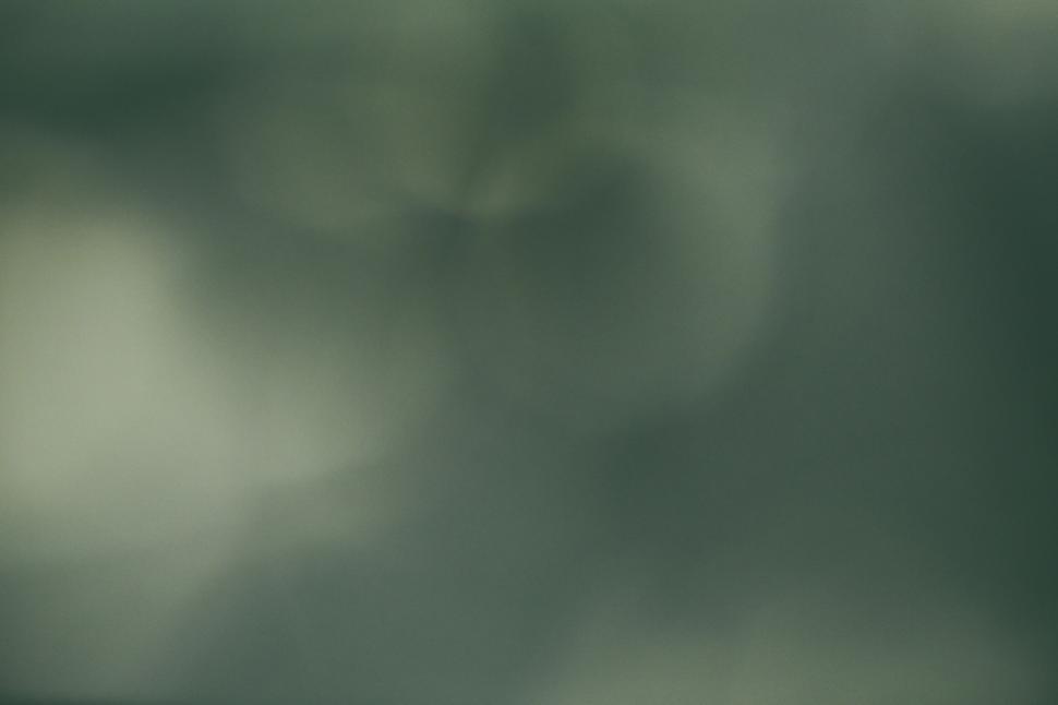 Free Image of Dark blurred image with green tones 