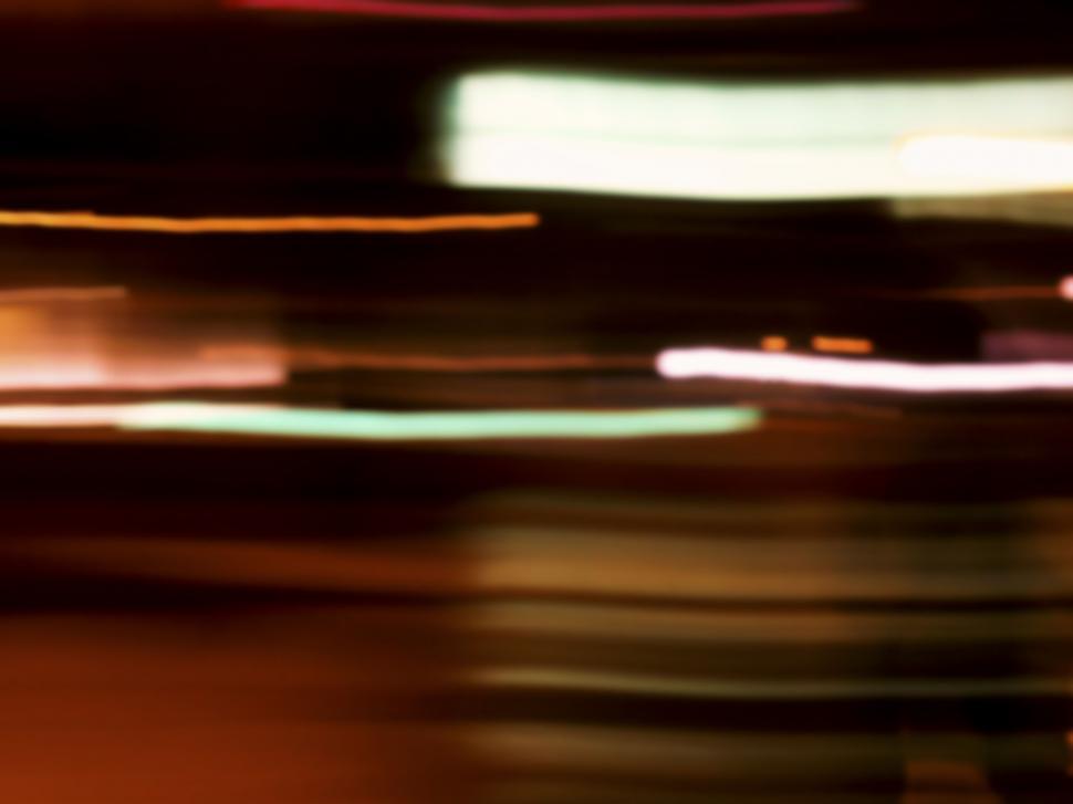 Free Image of Abstract warm light motion blur background 