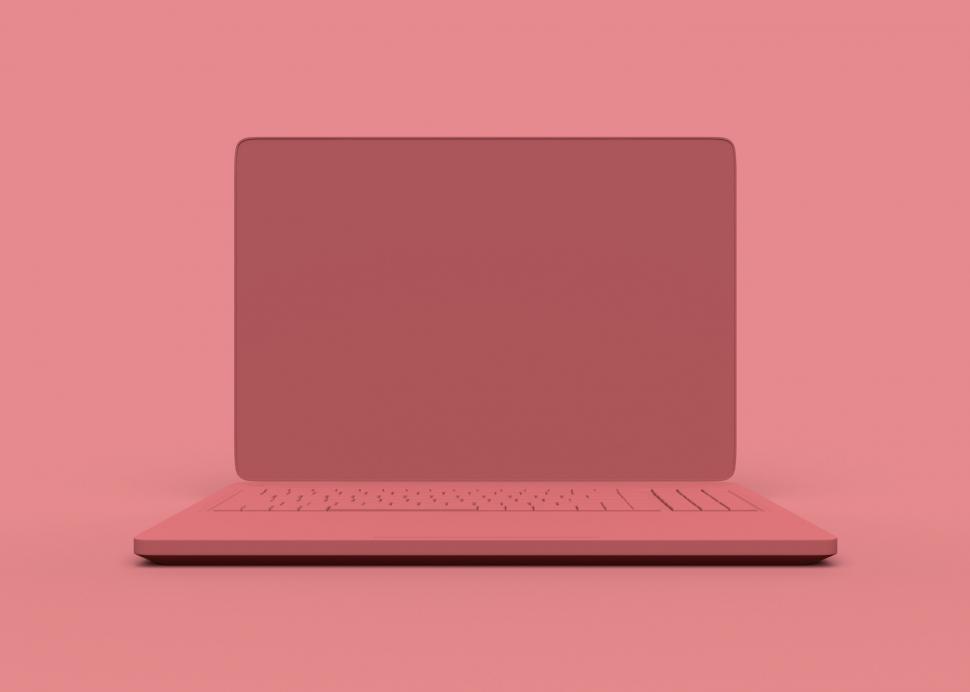 Free Image of Minimalist pink laptop on solid background 