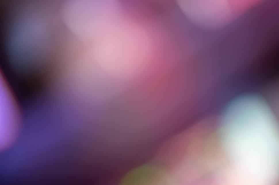Free Image of Abstract purple and pink bokeh background 