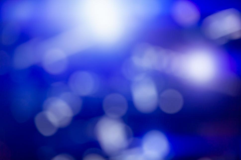 Free Image of Blue abstract background with light bokeh 