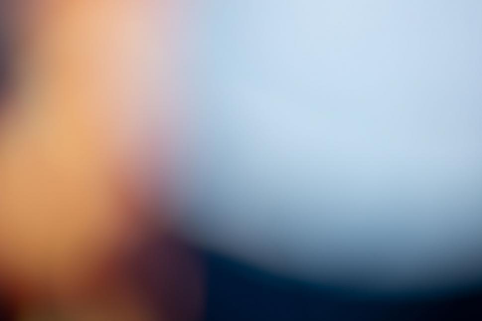 Free Image of Abstract blur of blue and orange hues 