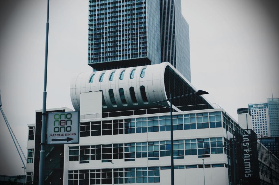 Free Image of Modern building with tube-like design feature 