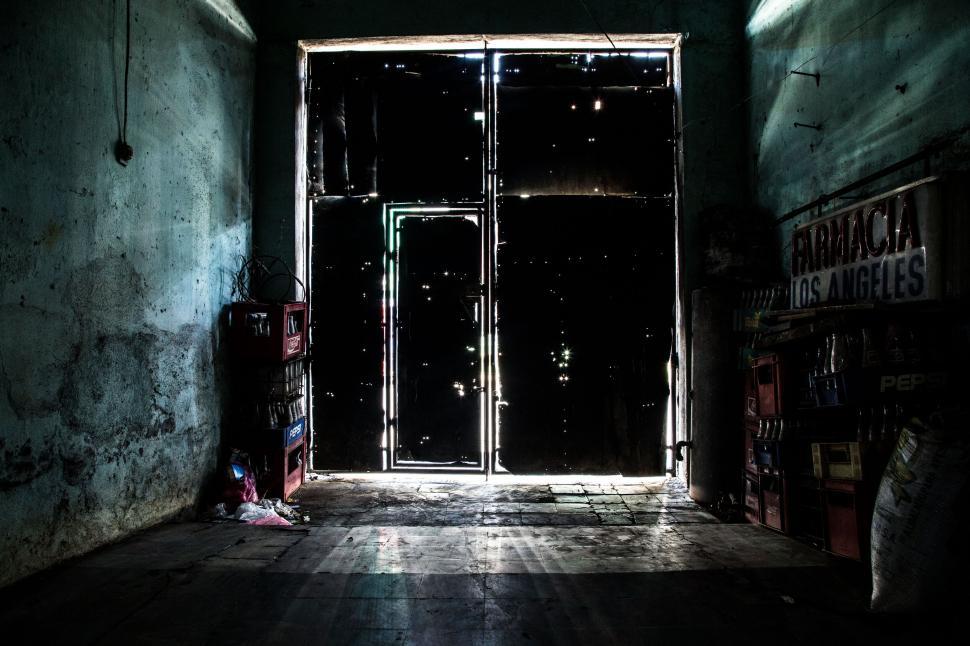Free Image of Abandoned room with open door and light 