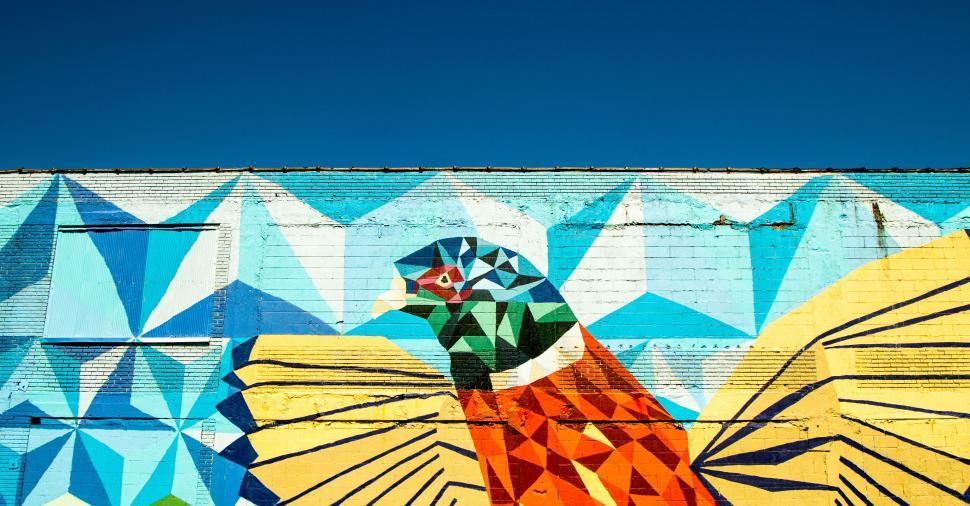 Free Image of Colorful geometric mural on building 
