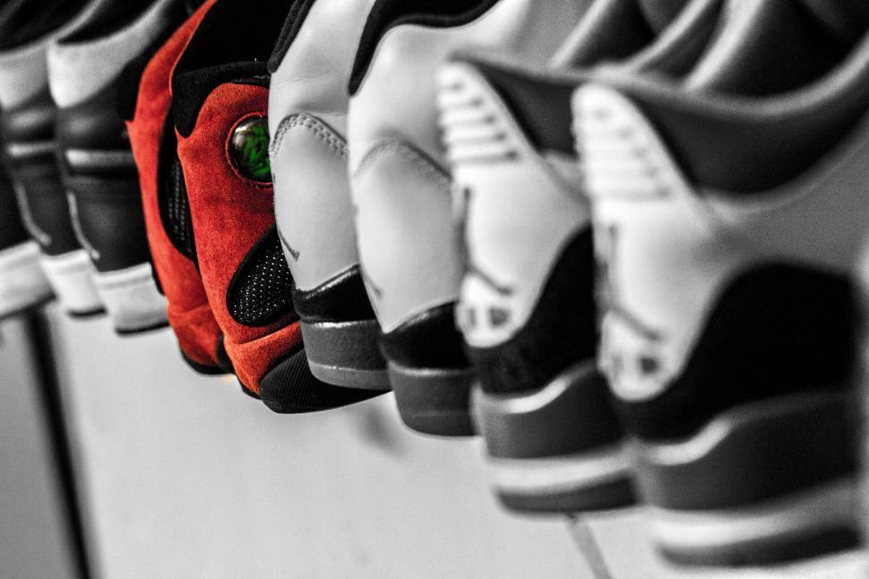 Free Image of Sneakers on display with color accent 