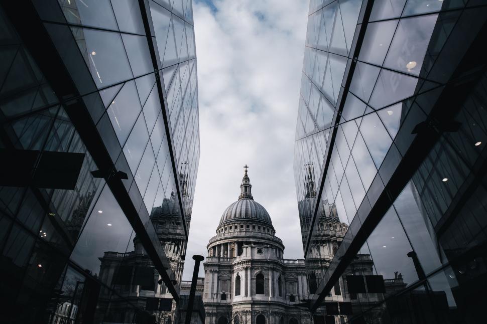 Free Image of St Paul s Cathedral reflected in modern glass 