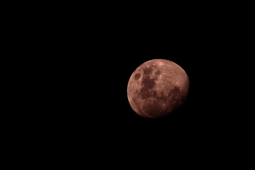Free Image of Full moon in a dark night sky 