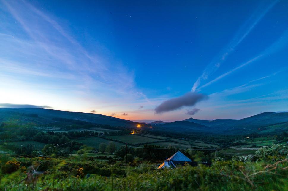 Free Image of Twilight over a tranquil countryside landscape 