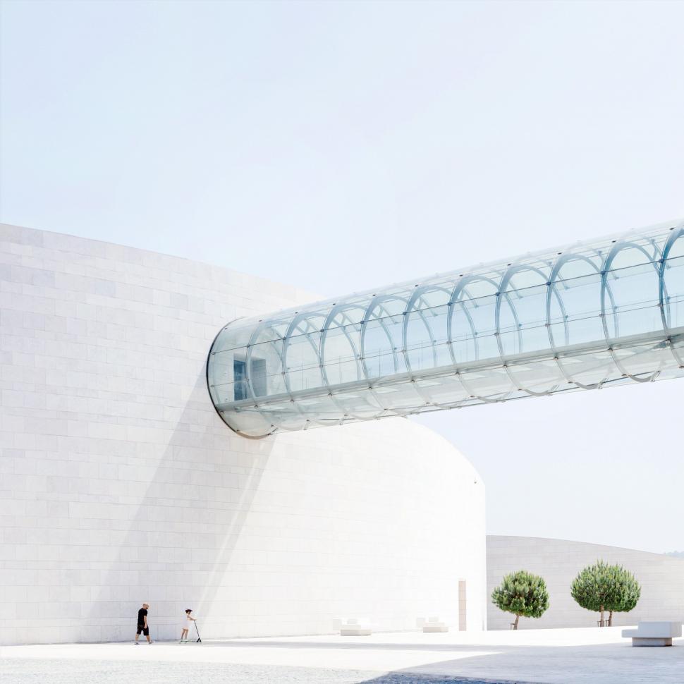 Free Image of Modern bridge connecting cultural buildings 