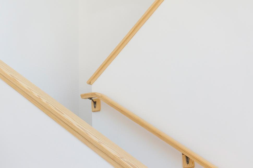 Free Image of Modern staircase with wooden handrails 