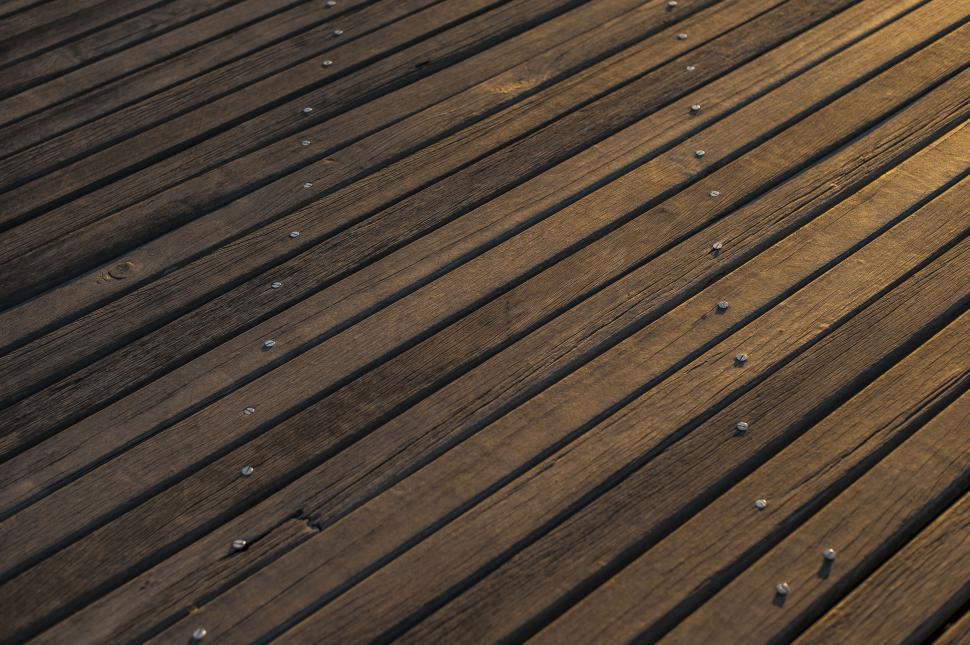 Free Image of Sunlight on wooden deck planks texture 