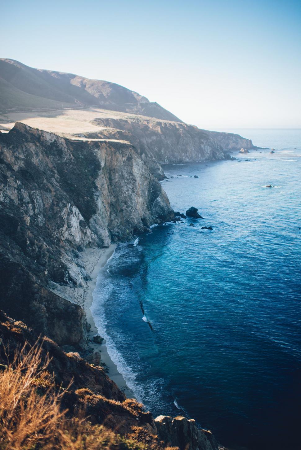 Free Image of Breathtaking coastal cliffs and blue sea 