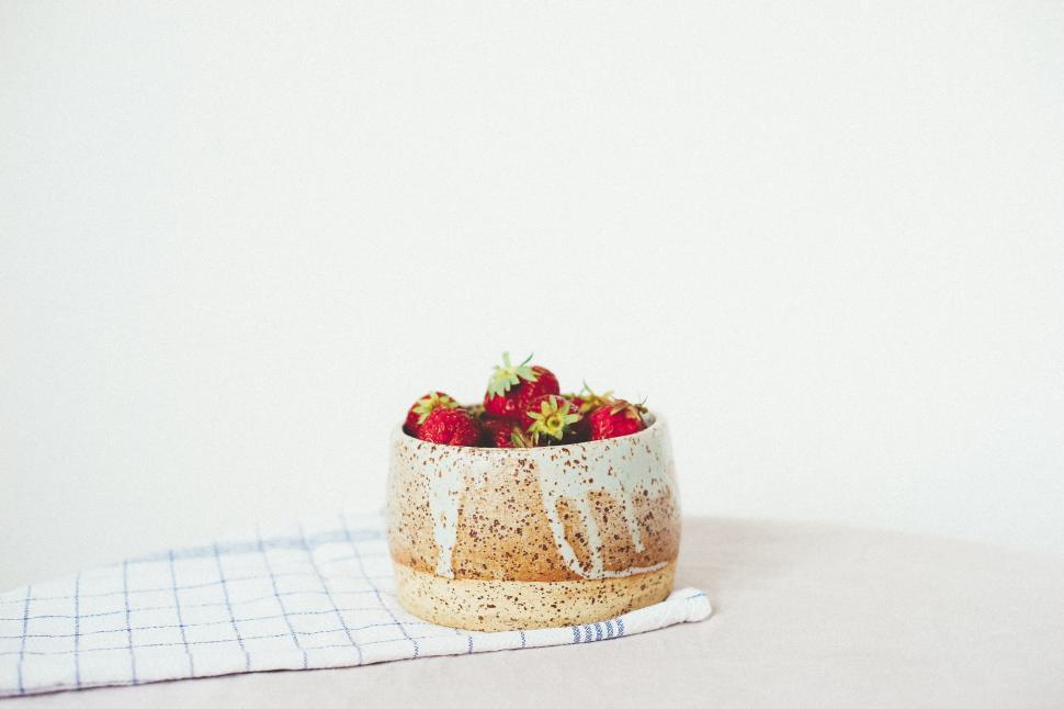 Free Image of Bowl of strawberries on minimalistic setup 