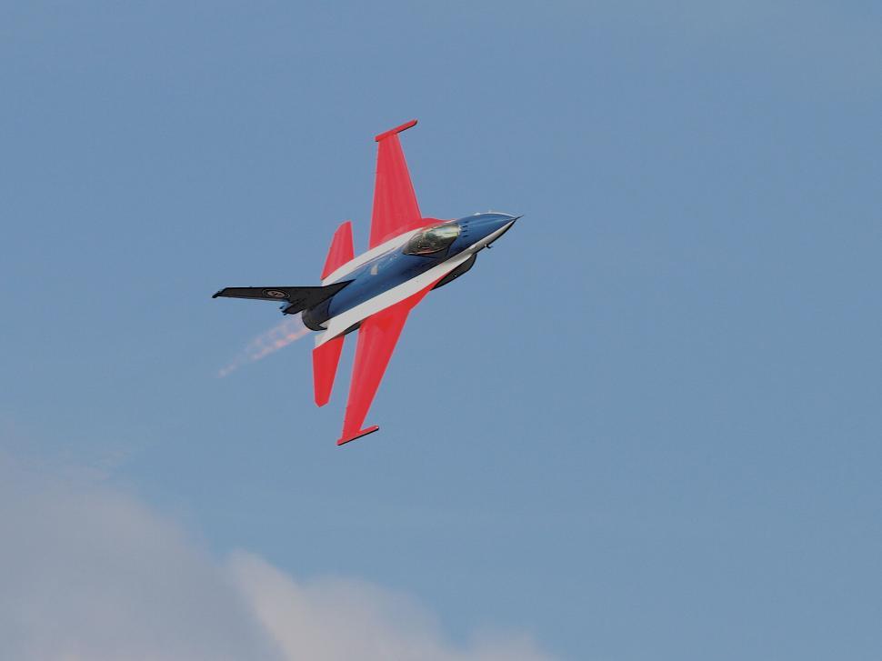 Free Image of Jet fighter performing aerial maneuvers 