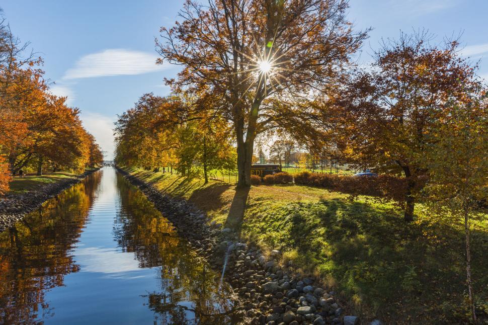 Free Image of Autumnal scene by a calm canal 