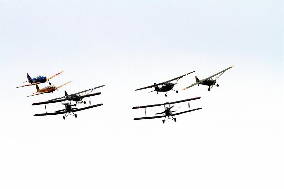 Free Image of Formation of vintage planes in flight 