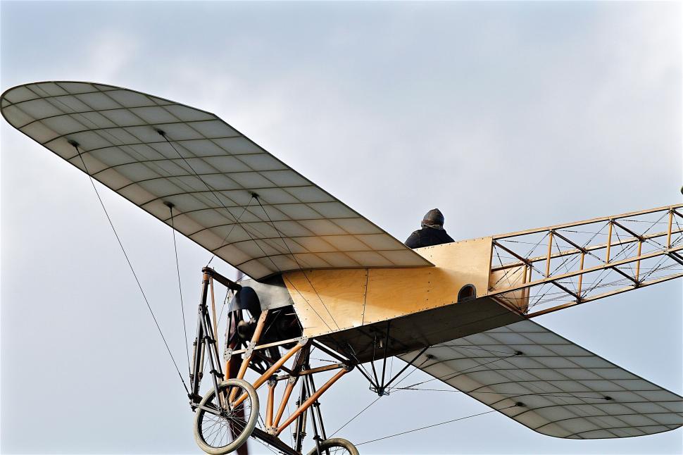 Free Image of Early aviation pioneer in a vintage plane 