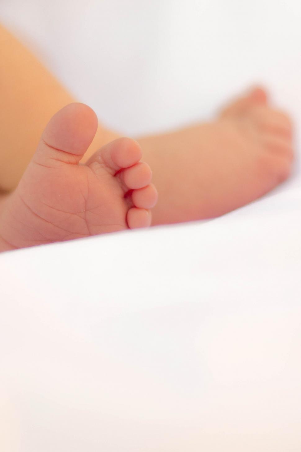 Free Image of Close-up of a baby s tiny feet 