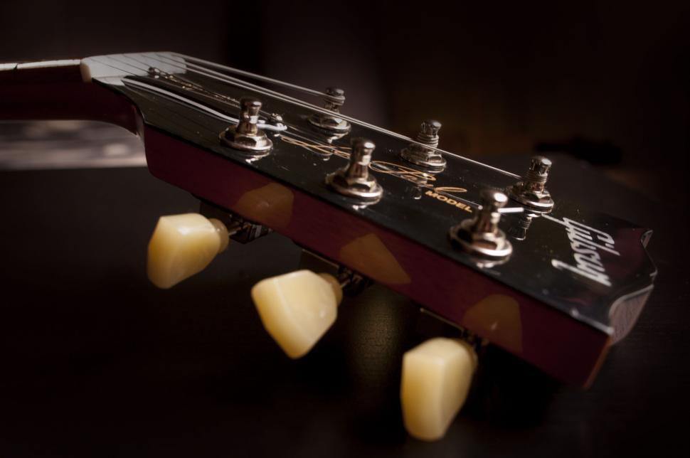 Free Image of Headstock of a glossy electric guitar 