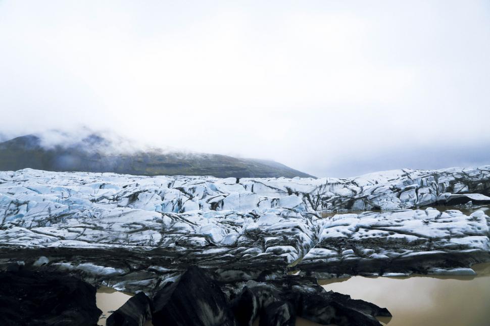 Free Image of Glacier and icy landscape under fog 