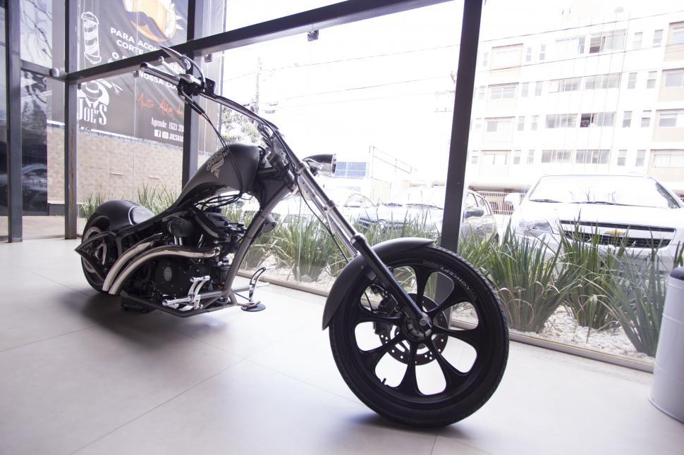 Free Image of Custom motorcycle at a showroom display 