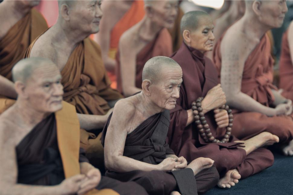 Free Image of Monks in meditation with focus on elder 