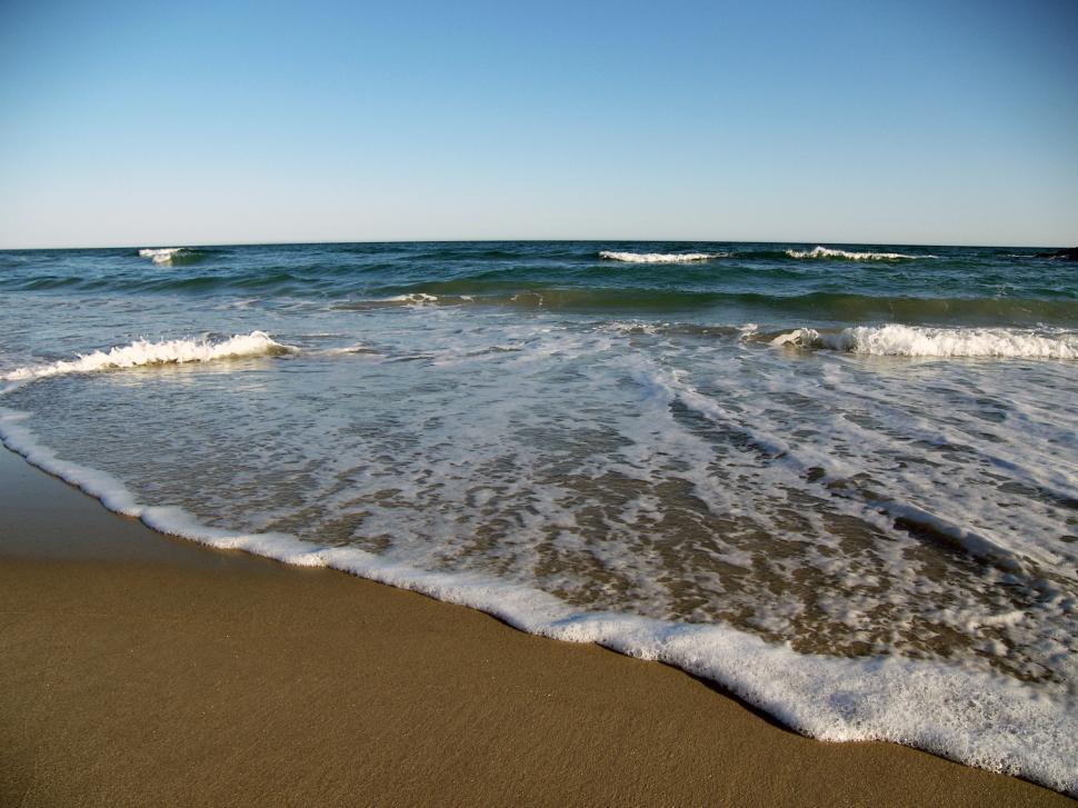 Free Image of Sandy Beach With Waves 