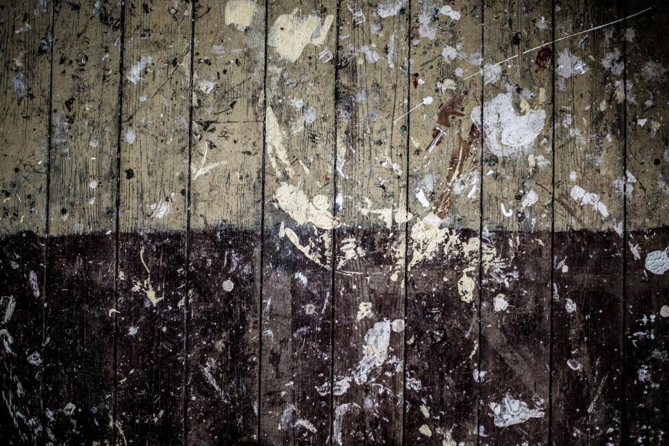 Free Image of Textured wooden surface with paint splatters 