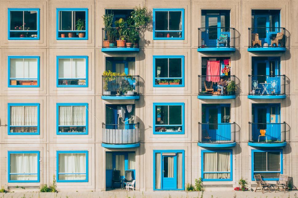 Free Image of Colorful apartment balconies with plants 