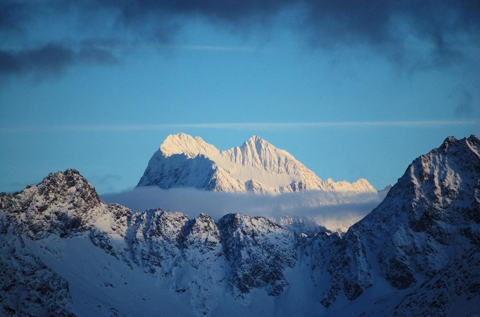 Free Image of Majestic snow-capped mountain peaks 
