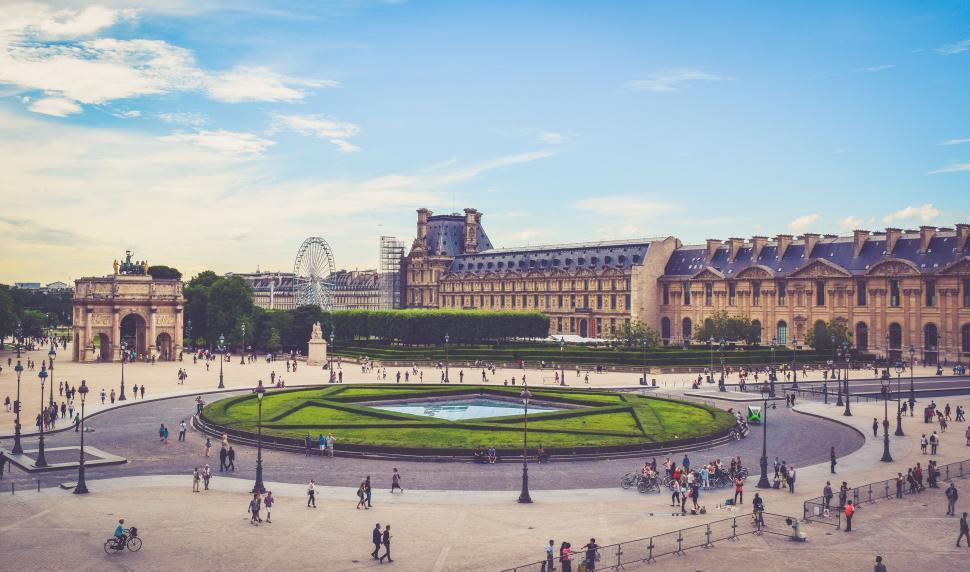 Free Image of Scenic view of Paris Louvre and ferris wheel 