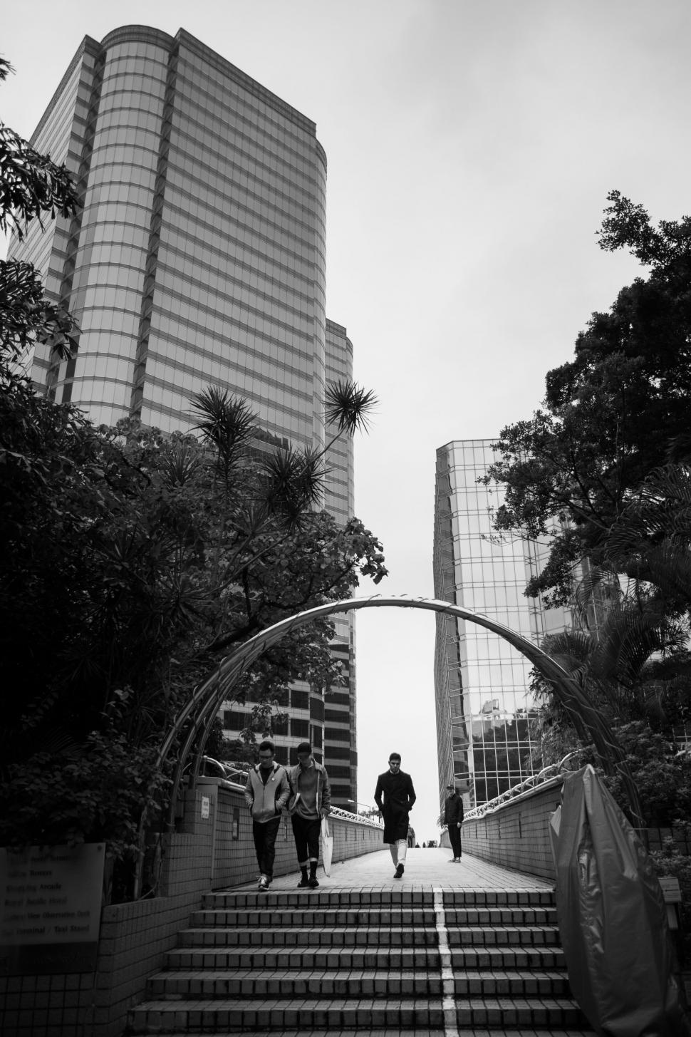 Free Image of Cityscape through circular archway 