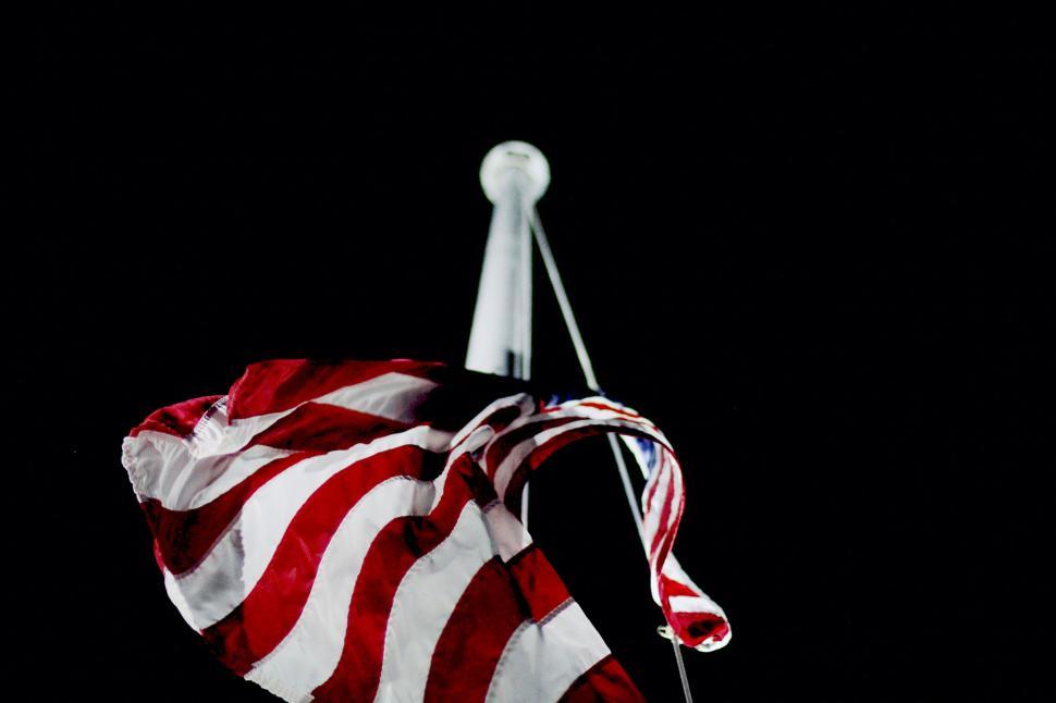 Free Image of American flag waving at night 