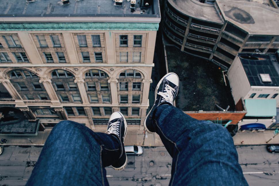 Free Image of Looking down at shoes from a high building 
