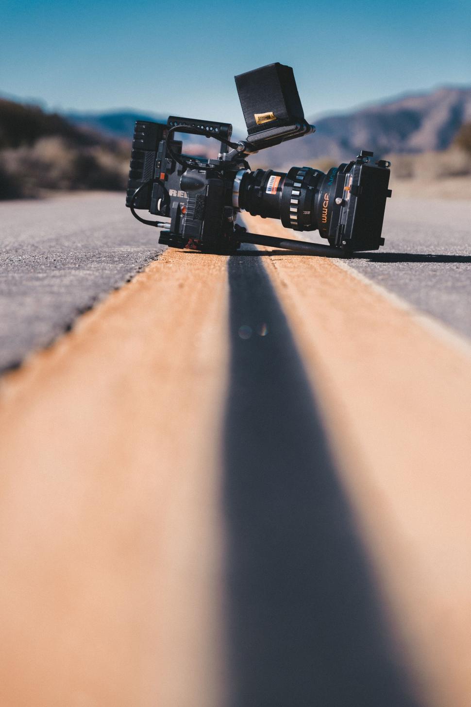 Free Image of Professional camera on deserted road 