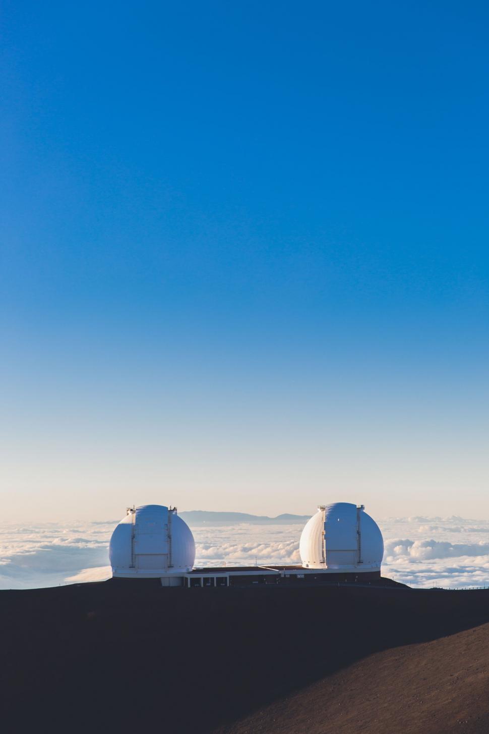 Free Image of Observatory domes against blue sky 
