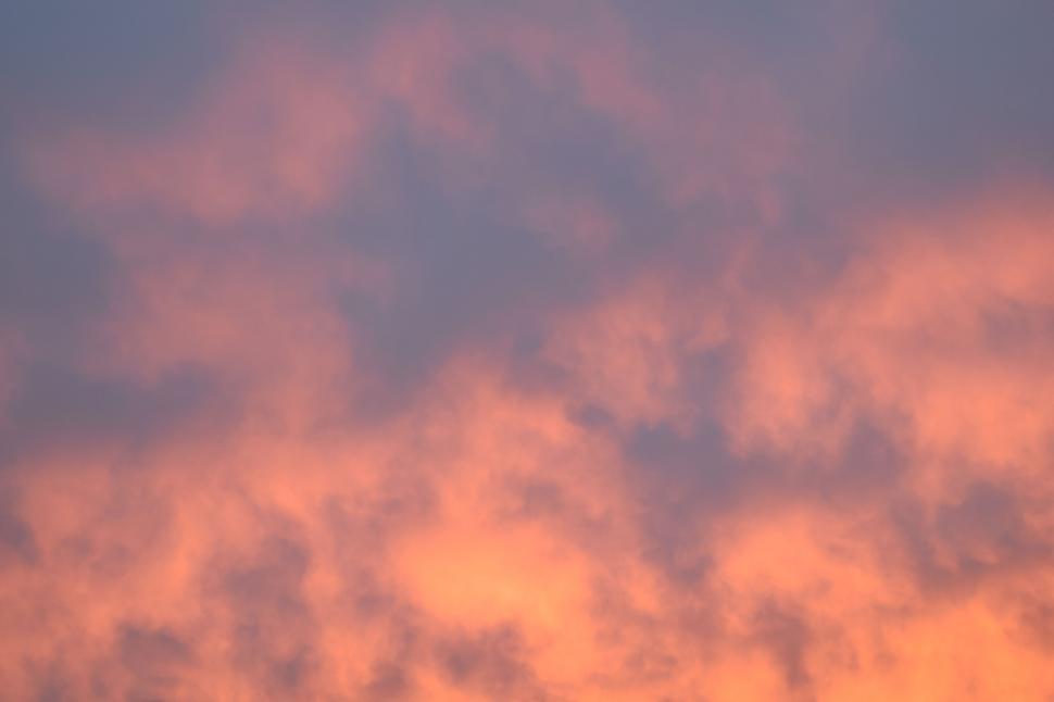 Free Image of Sunset sky with vibrant orange clouds 