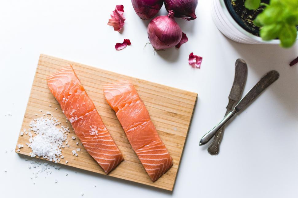 Free Image of Salmon fillets on cutting board 