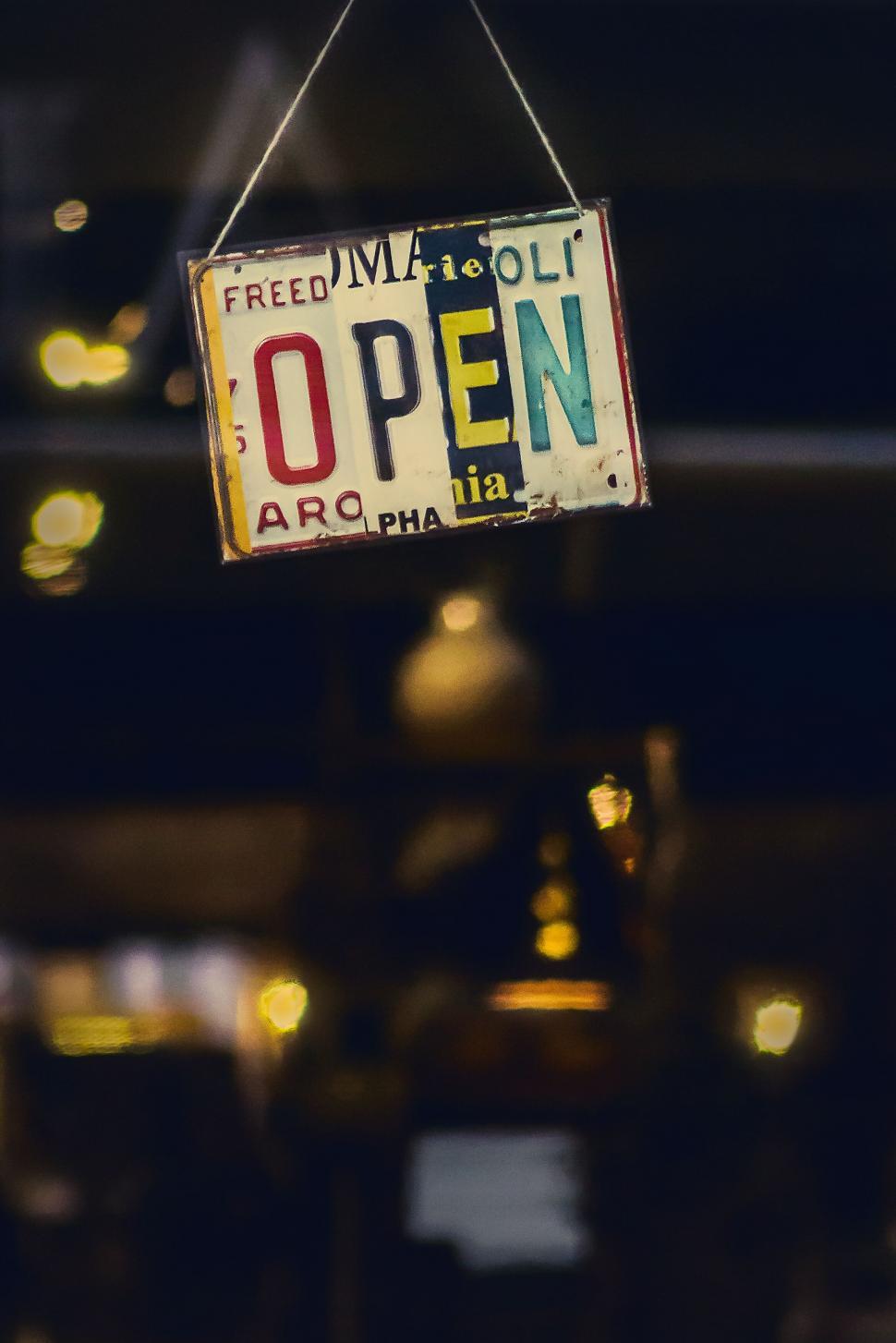 Free Image of Vintage open sign with eclectic styling 