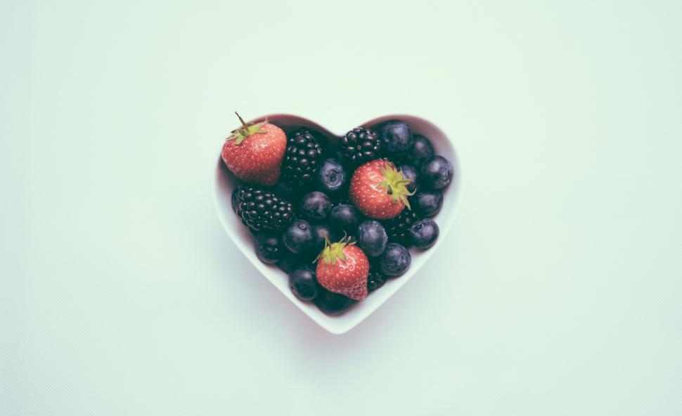 Free Image of Heart-shaped bowl with mixed berries 
