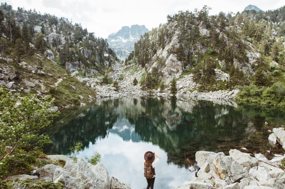 Free Image of Person admiring mountain lake landscape 