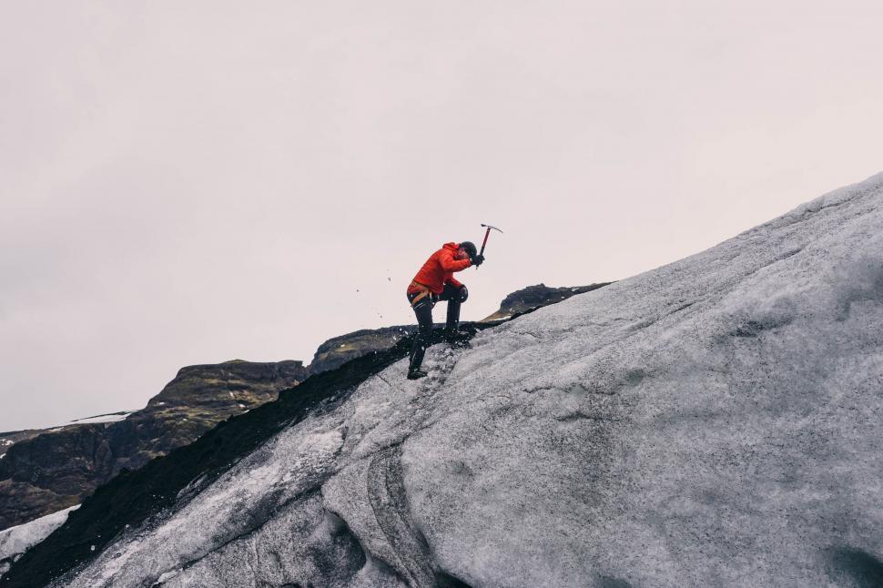 Free Image of Climber ascending a snowy slope 