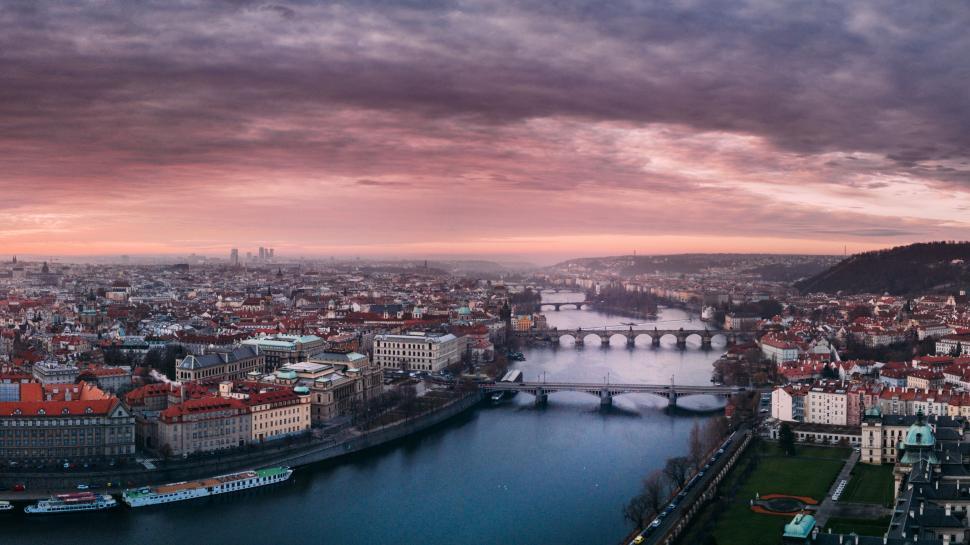 Free Image of Aerial cityscape with bridges at dawn 