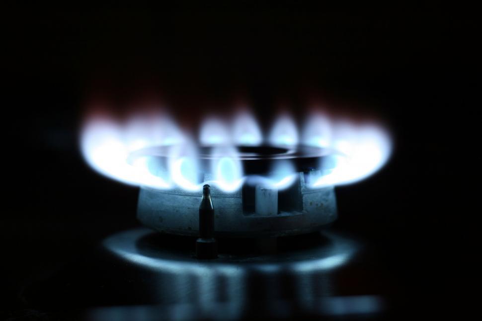 Free Image of Blue gas stove flames in the dark 