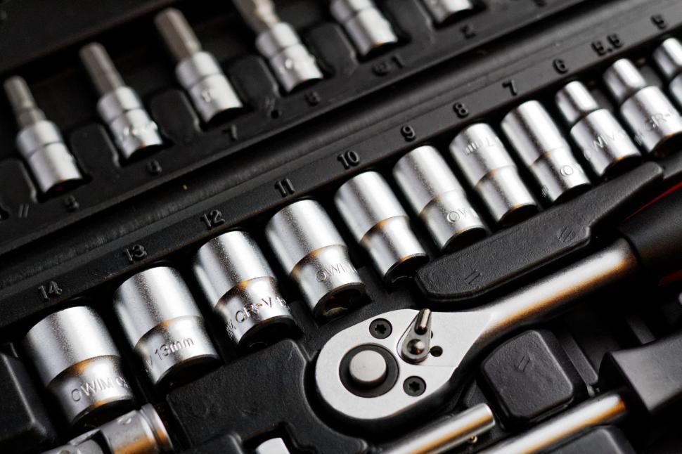 Free Image of Ratchet and socket set organized in box 