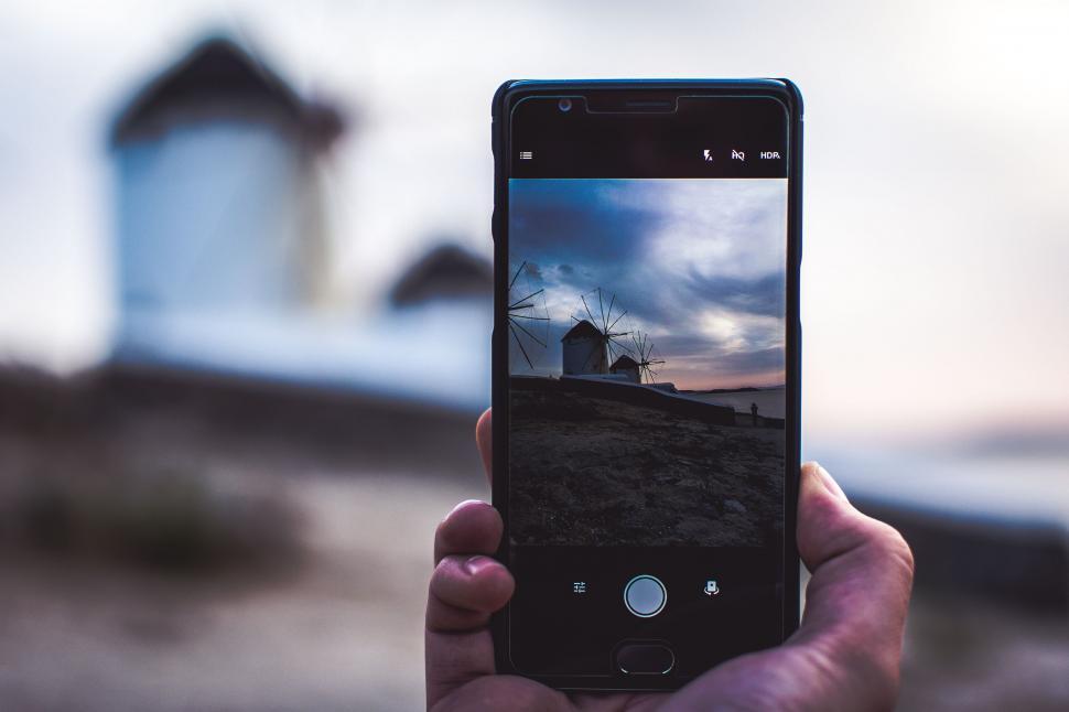 Free Image of Capturing windmills on a mobile screen 